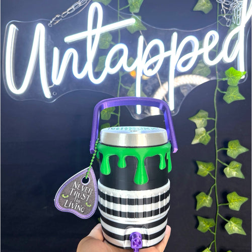 Untapped Innovations Beetlejuice themed insulated beverage cooler with black and white stripes and neon green slime.