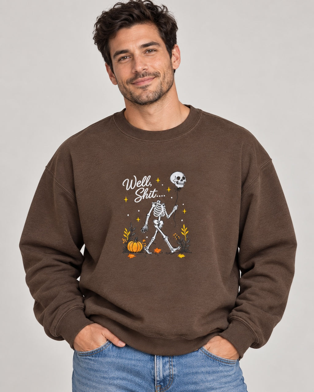 Untapped Innovations chocolate brown crewneck sweatshirt featuring a skeleton graphic with a balloon and pumpkin