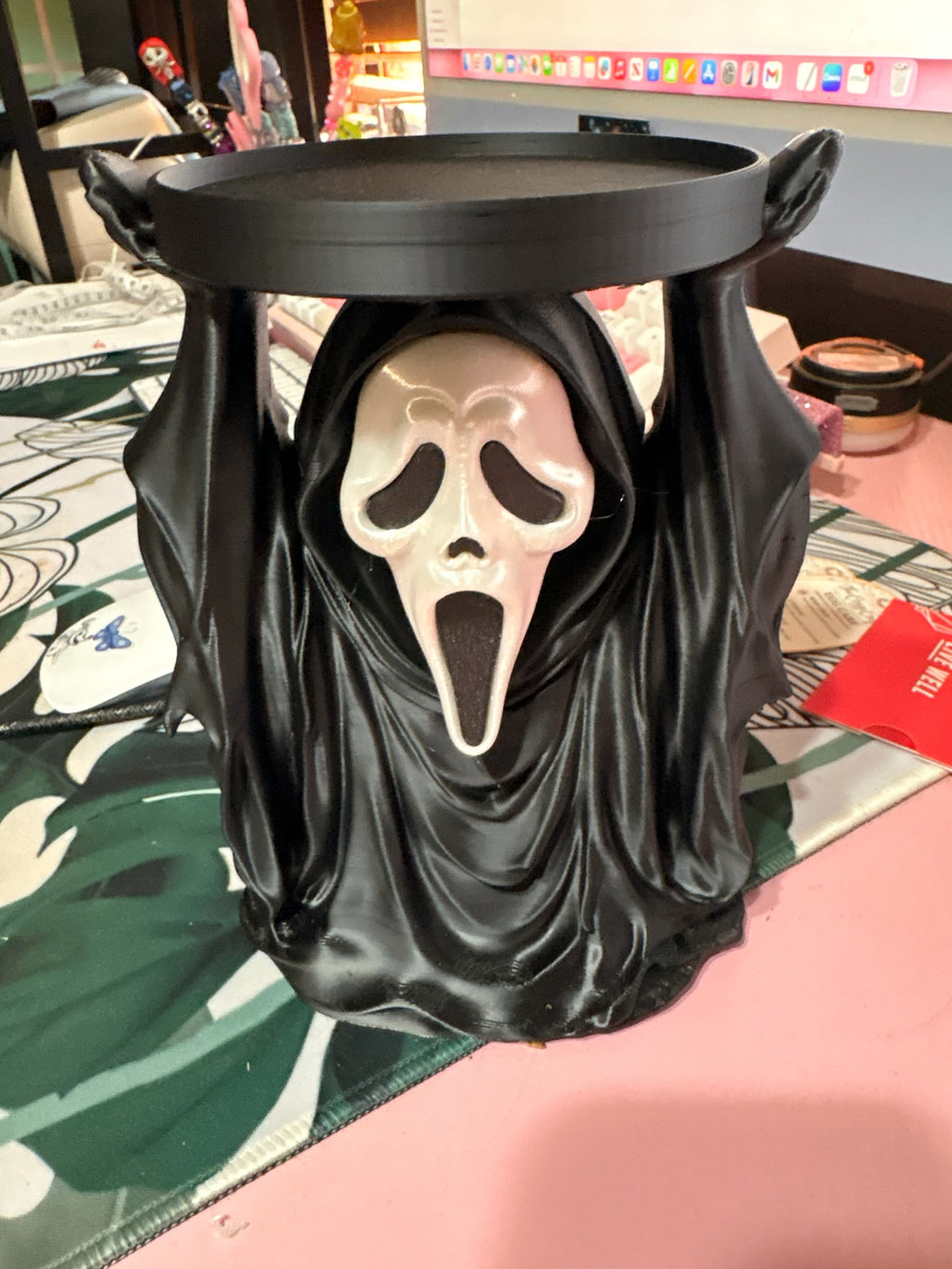 Untapped Innovations horror-themed ghost face candle holder with a black hooded figure and white mask design