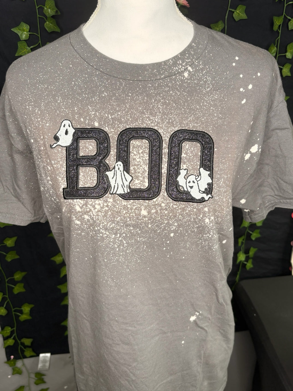 Untapped Innovations grey bleached-effect t-shirt with embroidered BOO text and playful ghost characters.