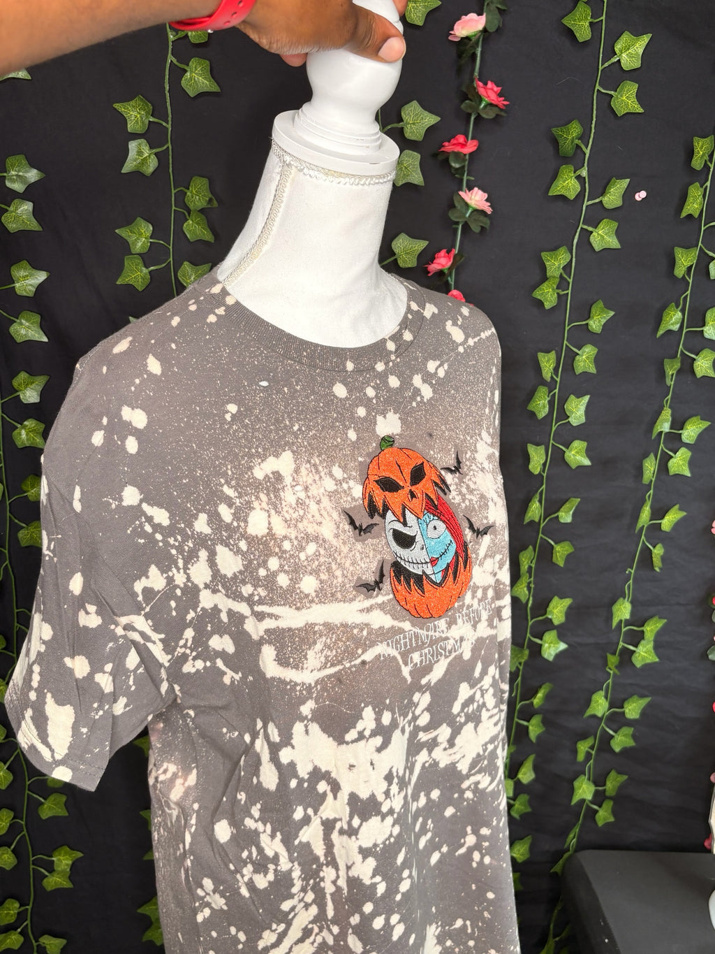 Untapped Innovations Nightmare Before Christmas bleached t-shirt with Jack and Sally pumpkin embroidery on grey fabric