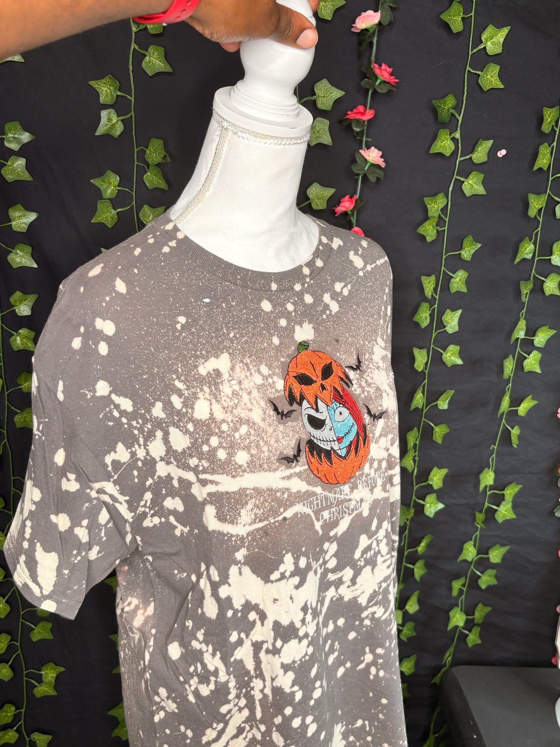 Untapped Innovations Nightmare Before Christmas bleached t-shirt with Jack and Sally pumpkin embroidery on grey fabric