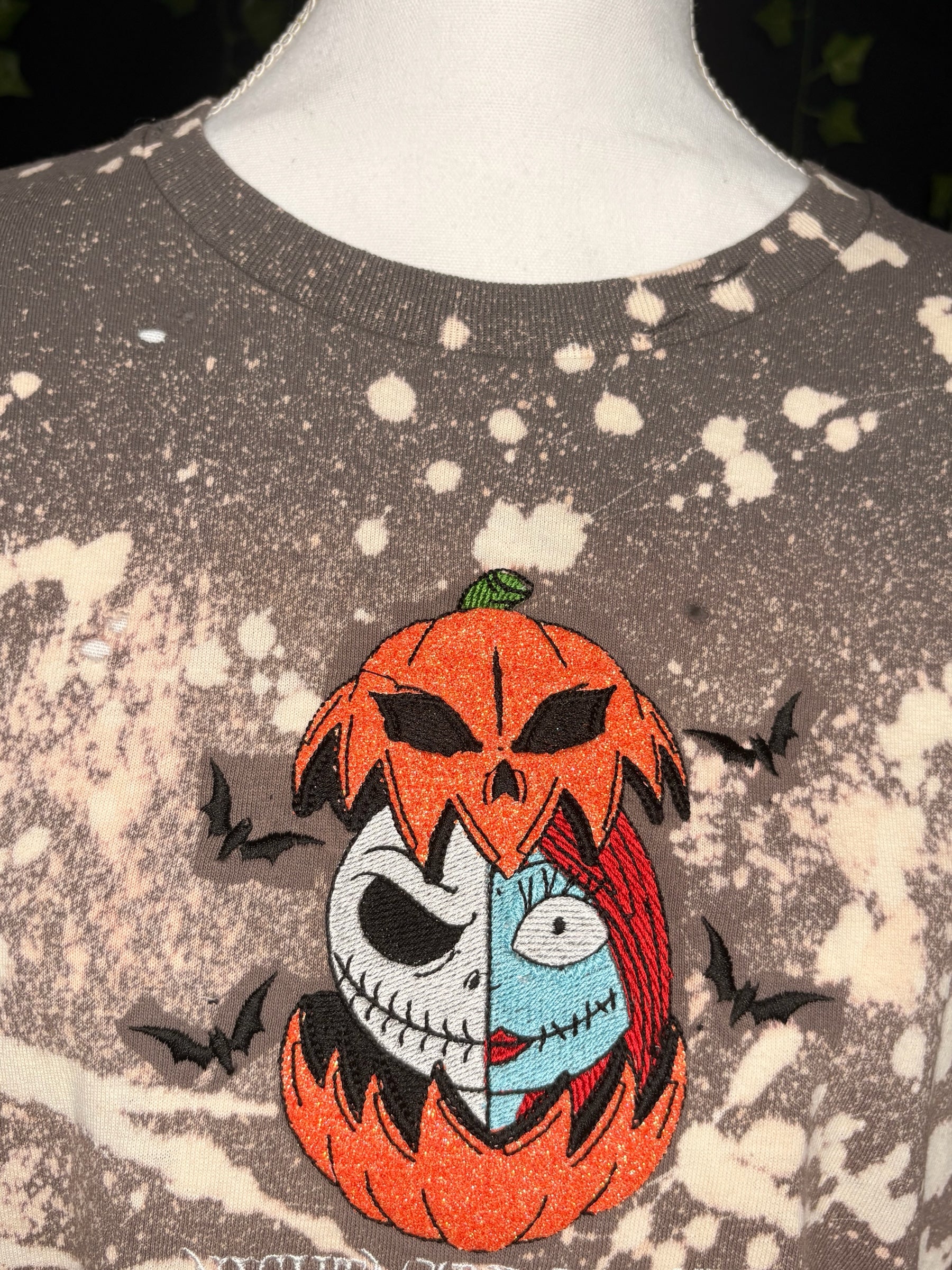 Untapped Innovations Nightmare Before Christmas bleached t-shirt with embroidered Jack and Sally pumpkin design