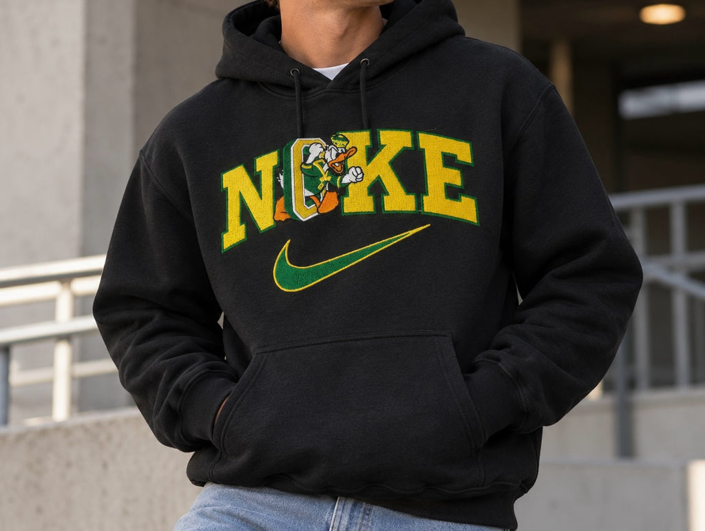 Untapped Innovations black Nike University of Oregon fleece hoodie with embroidered team graphic and kangaroo pocket