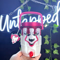 Untapped Innovations Pennywise beverage dispenser with white base, pink handle, and red rhinestone drip effect.