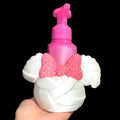Untapped Innovations character themed foaming soap dispenser with white satin base and sparkling pink rhinestone bow.