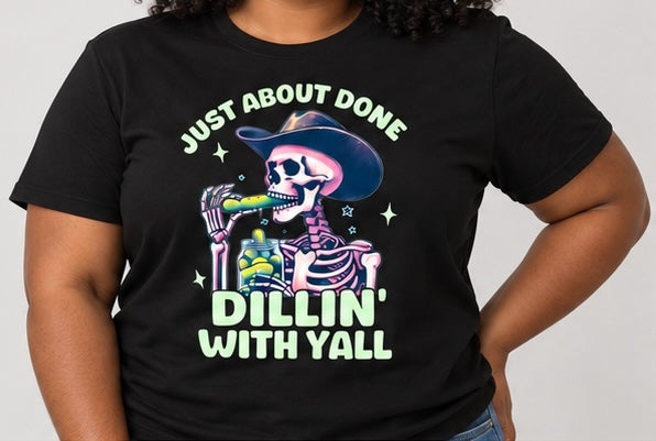 Untapped Innovations black crewneck t-shirt featuring a graphic of a cowboy skeleton eating a pickle