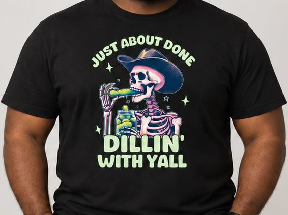 Untapped Innovations black crewneck t-shirt featuring a graphic of a skeleton cowboy eating a pickle