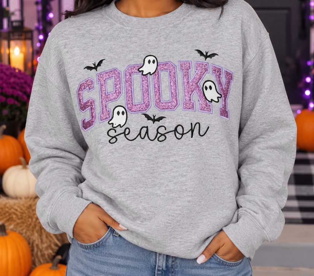 Untapped Innovations heather grey crewneck sweatshirt with purple glitter Spooky Season graphic and ghost bat motifs