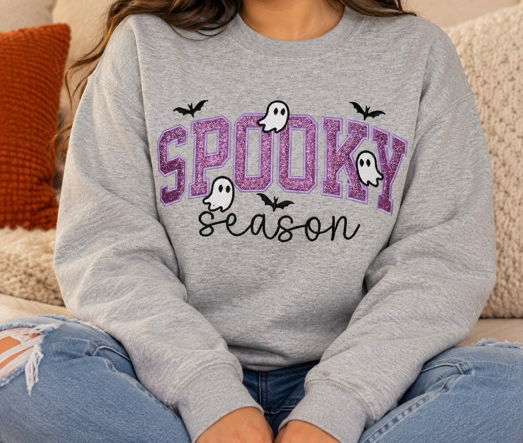 Untapped Innovations heather grey crewneck sweatshirt with purple glitter Spooky Season graphic and ghost illustrations
